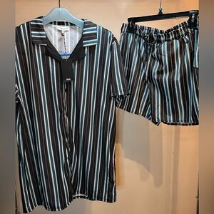 Matching beach set. Includes bottom down shirt and swimming shorts.